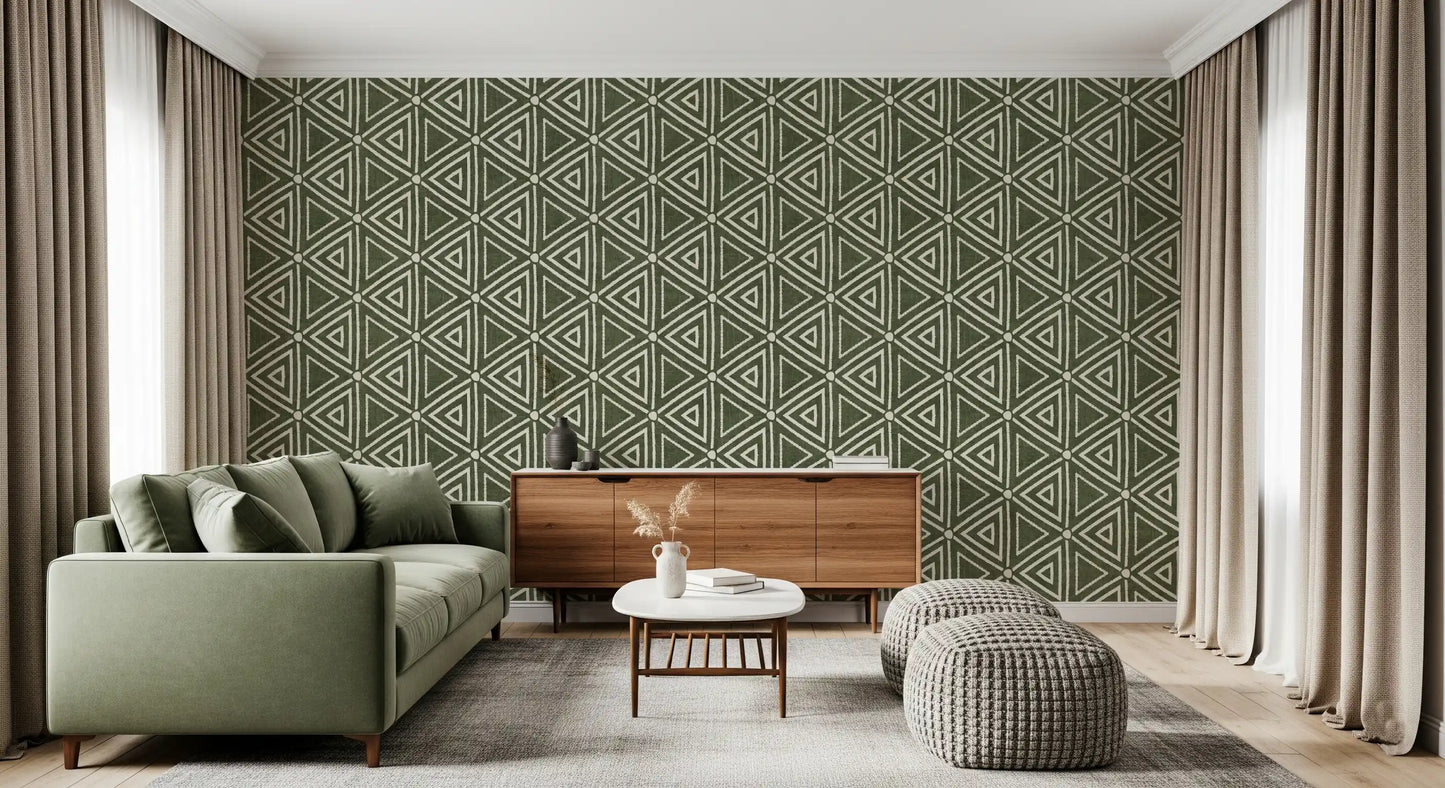 Living room set against ivory triangles on the moss green wallpaper