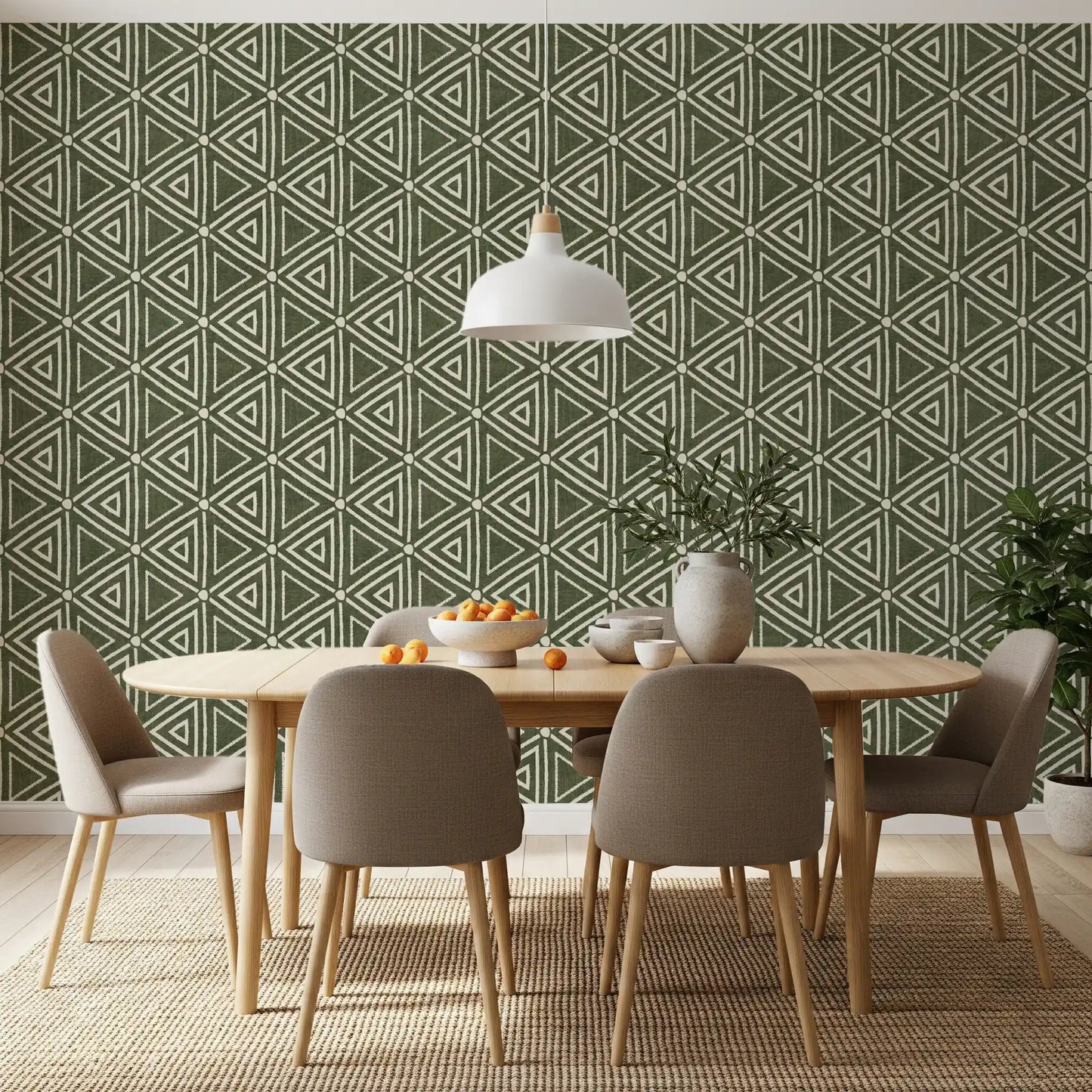 Deep olive green sets the base tone beneath the chalky boho triangle wallpaper