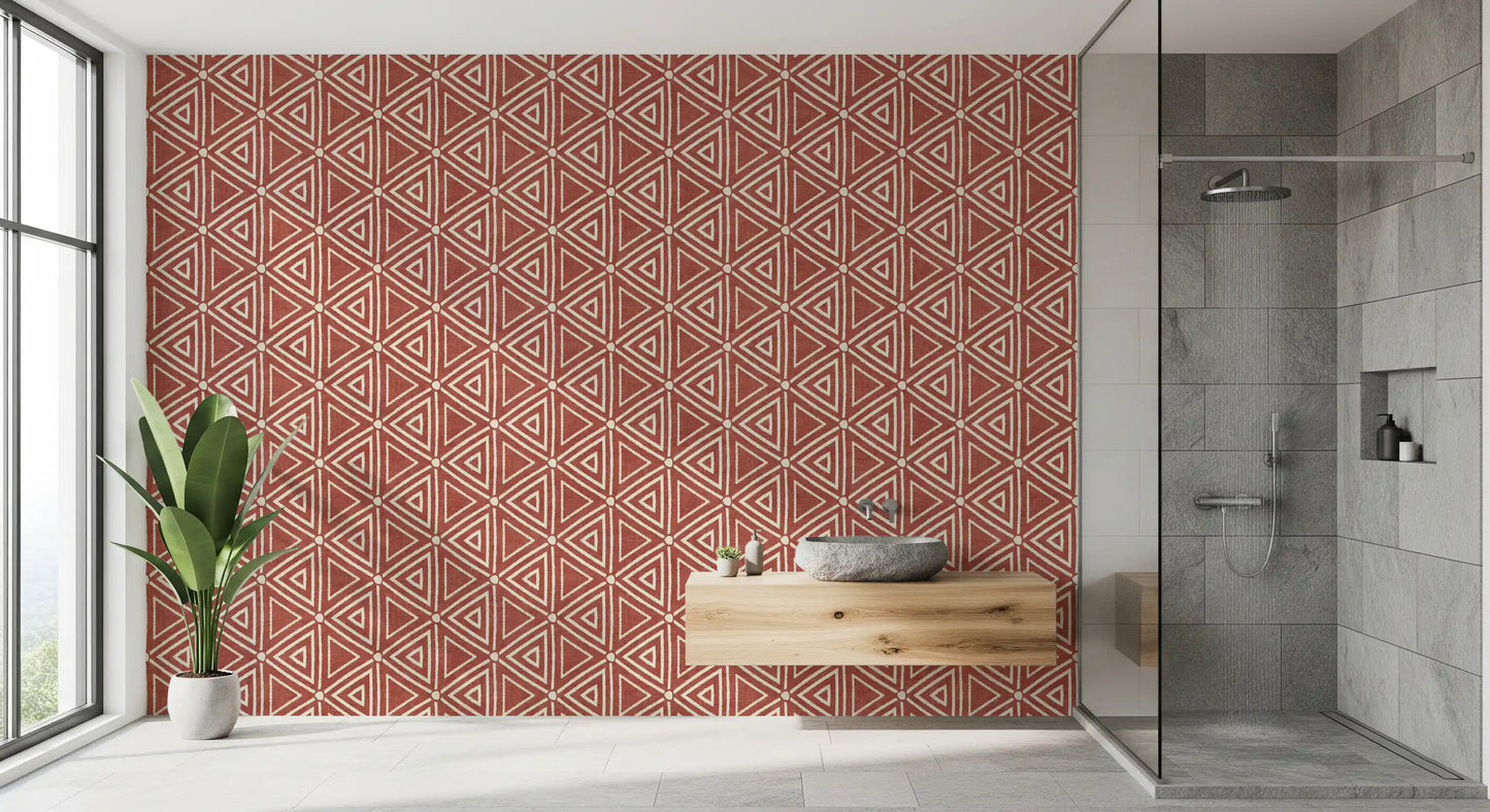 Two-tone rust and cream geometry repeating evenly on the wallpaper