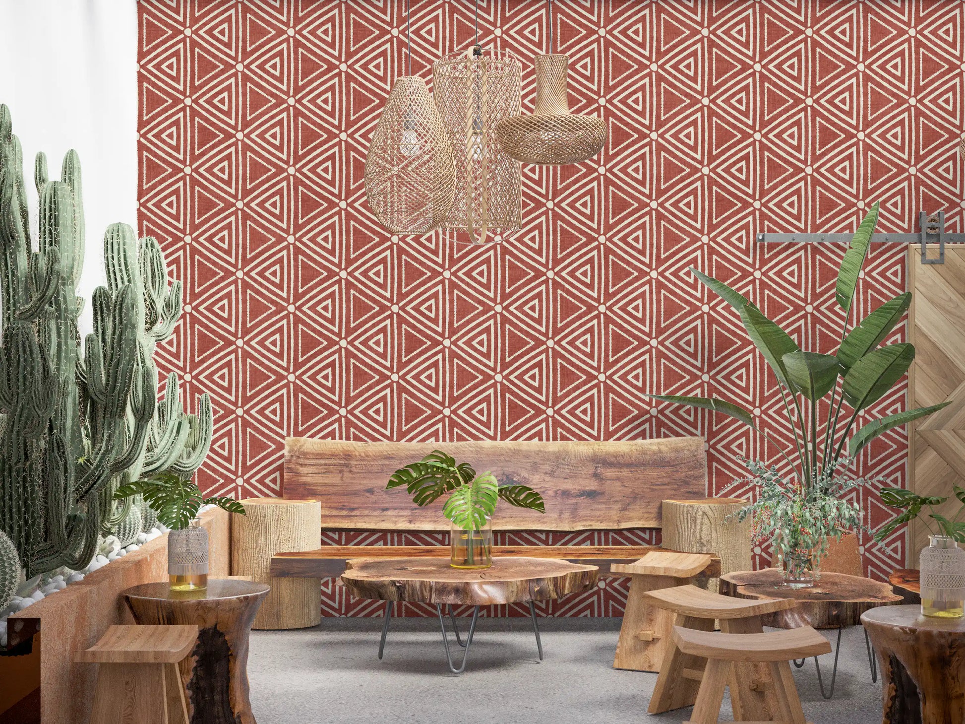 Nested cream triangles tiled over rust terracotta in this mudcloth wallpaper