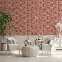 Repeating triangle mudcloth wallpaper framing a relaxed lounge