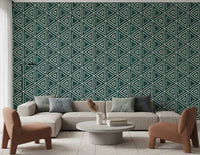 Nested teal triangles wrap a calm living room in Mudcloth Boho wallpaper