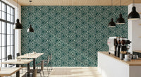 A faint linen grain sits behind the loose triangle motif of this Mudcloth Boho wallpaper