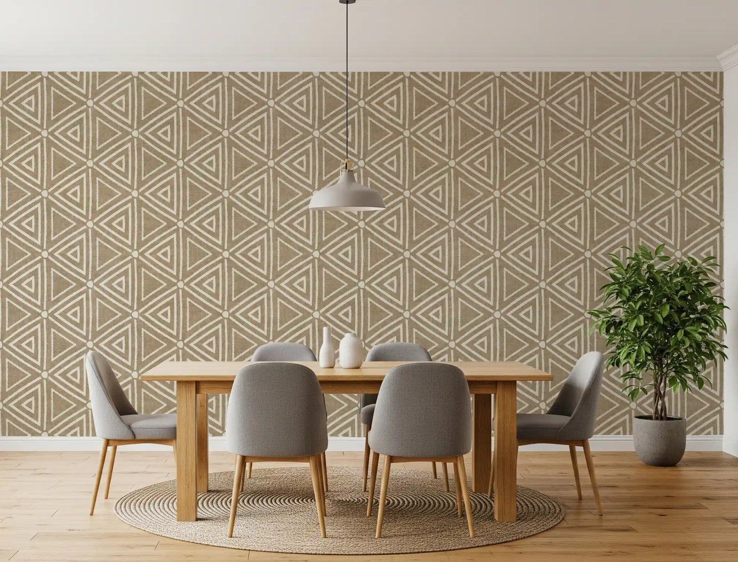 A grounded, neutral mood suits the dining room in this Mudcloth Triangles wallpaper