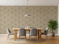 A grounded, neutral mood suits the dining room in this Mudcloth Triangles wallpaper