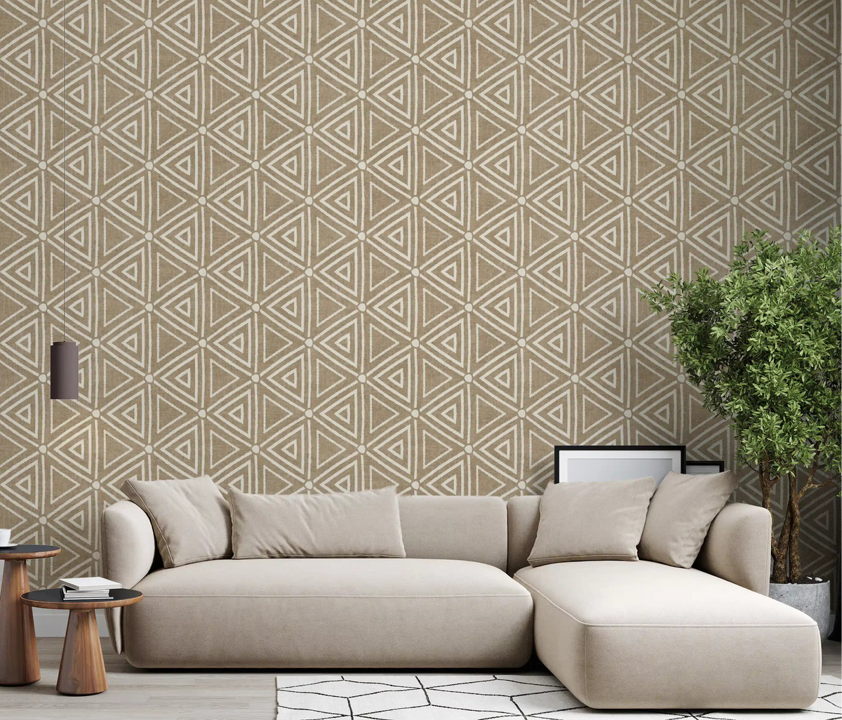 Beige triangles and cream outlines warm the living room in this Mudcloth Boho wallpaper