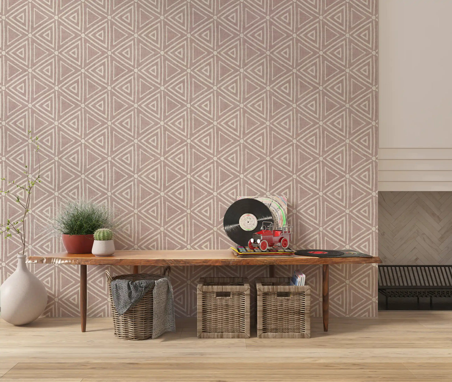 Geometric triangles patterning a quiet lounge in this boho mudcloth wallpaper