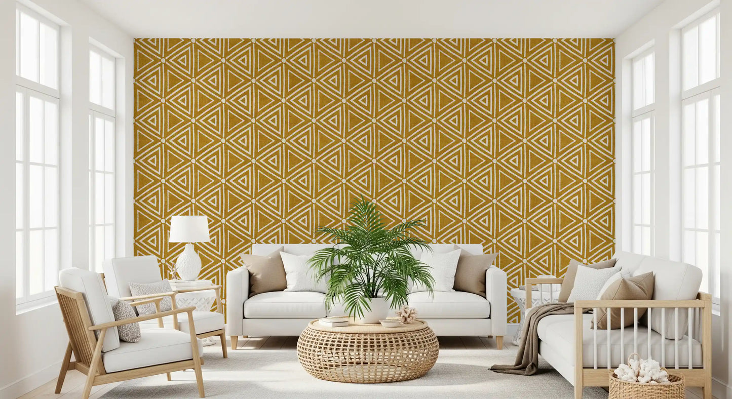 Warm mustard tones lift a hallway nook in boho mudcloth wallpaper