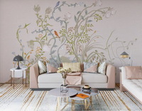 Chinoiserie songbird wall mural giving a living room a calm botanical mood