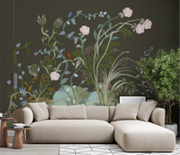 Olive ground sets a moody base for a living room in this chinoiserie wall mural