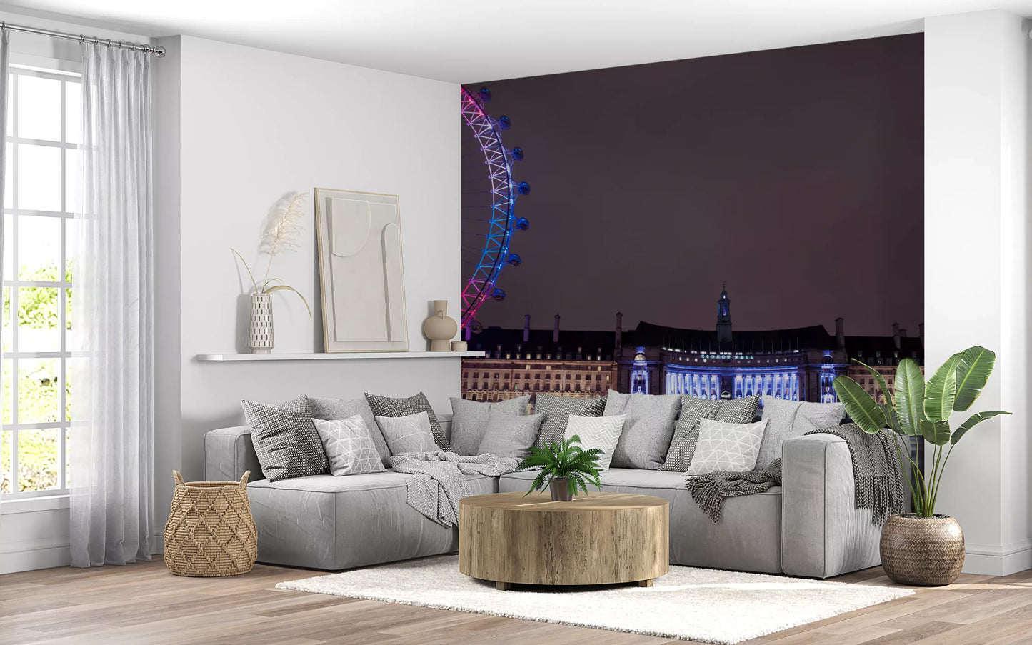 Magenta and blue tones drift along the living room beside this Night Glow wall mural