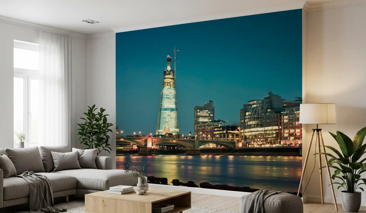 Sky-to-river gradient holds a lounge in mid-evening mood beneath this Skyline wall mural