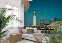 Lit bridge arches span above water reflections in this London wall mural