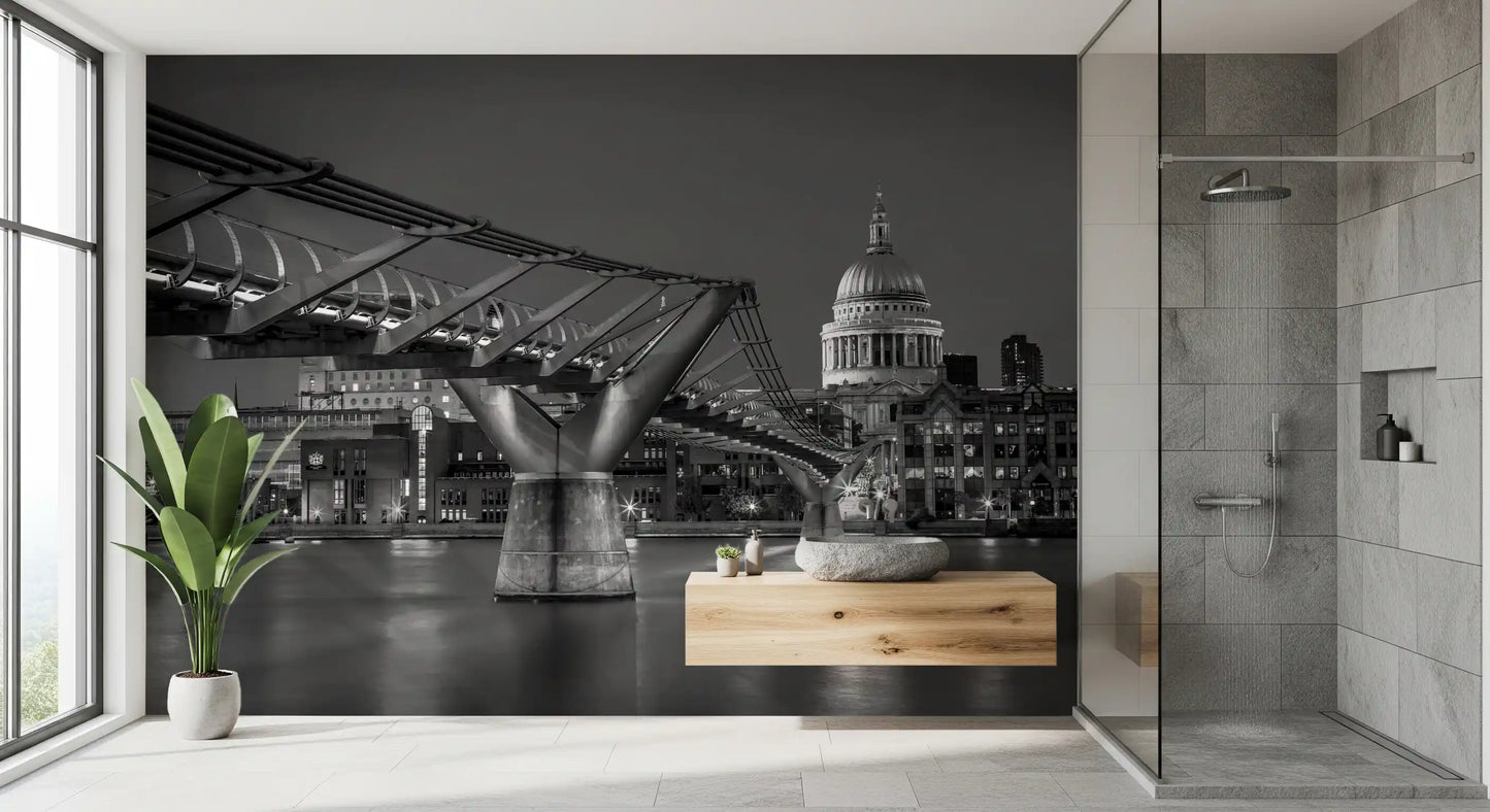 Steel cables curve into view through the Millennium Bridge wall mural in a bathroom.