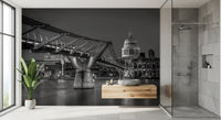 Steel cables curve into view through the Millennium Bridge wall mural in a bathroom.