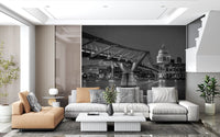 Light reflections play across the foreground of this Millennium Bridge wall mural.