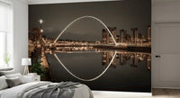 Quayside lamps add small warm pinpoints to the left edge of the Archway wall mural