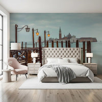 Pier posts and lagoon view fill a Bedroom with this Venetian Twilight wall mural