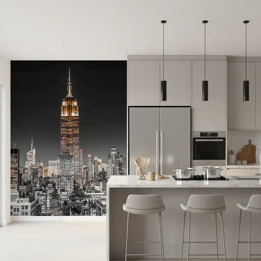 The Empire Glow: NYC Night in Grayscale Gold wall mural updates a modern kitchen.