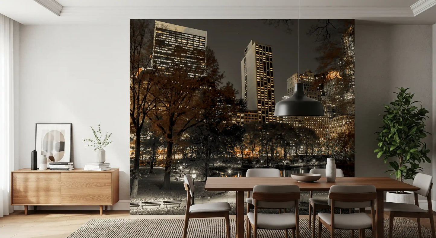 A muted dining room sits beneath the Urban Oasis Nights wall mural cityscape