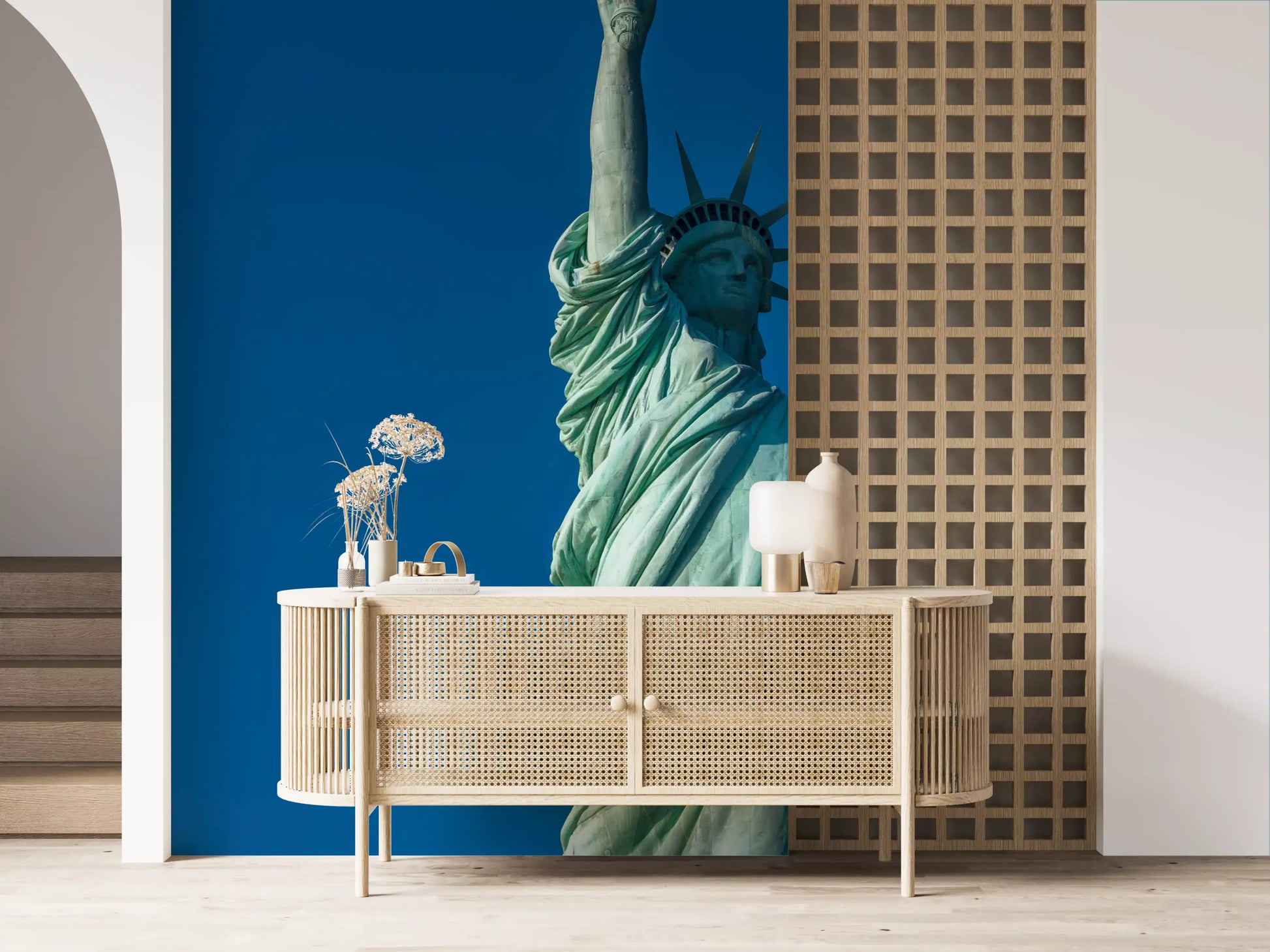 Sky gradient and copper figure of the Liberty's Grace wall mural lead a hallway run