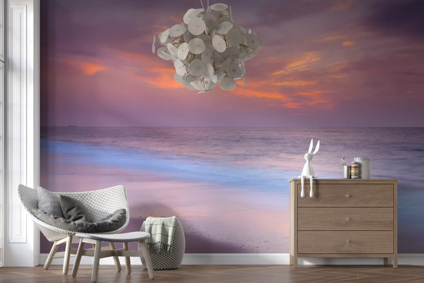 A lounge stays easy and warm with the Pastel Beach Serenity wall mural in full view.
