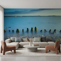 Misty water and pale dusk sky meet in this Ethereal Coastline wall mural arrangement.