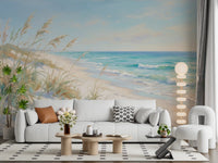 Turquoise surf and dune grass fill a lounge in this Coastal Dreamscape wall mural.