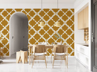 White curves crisscross the Textured Lattice Trellis wallpaper over mustard linen.