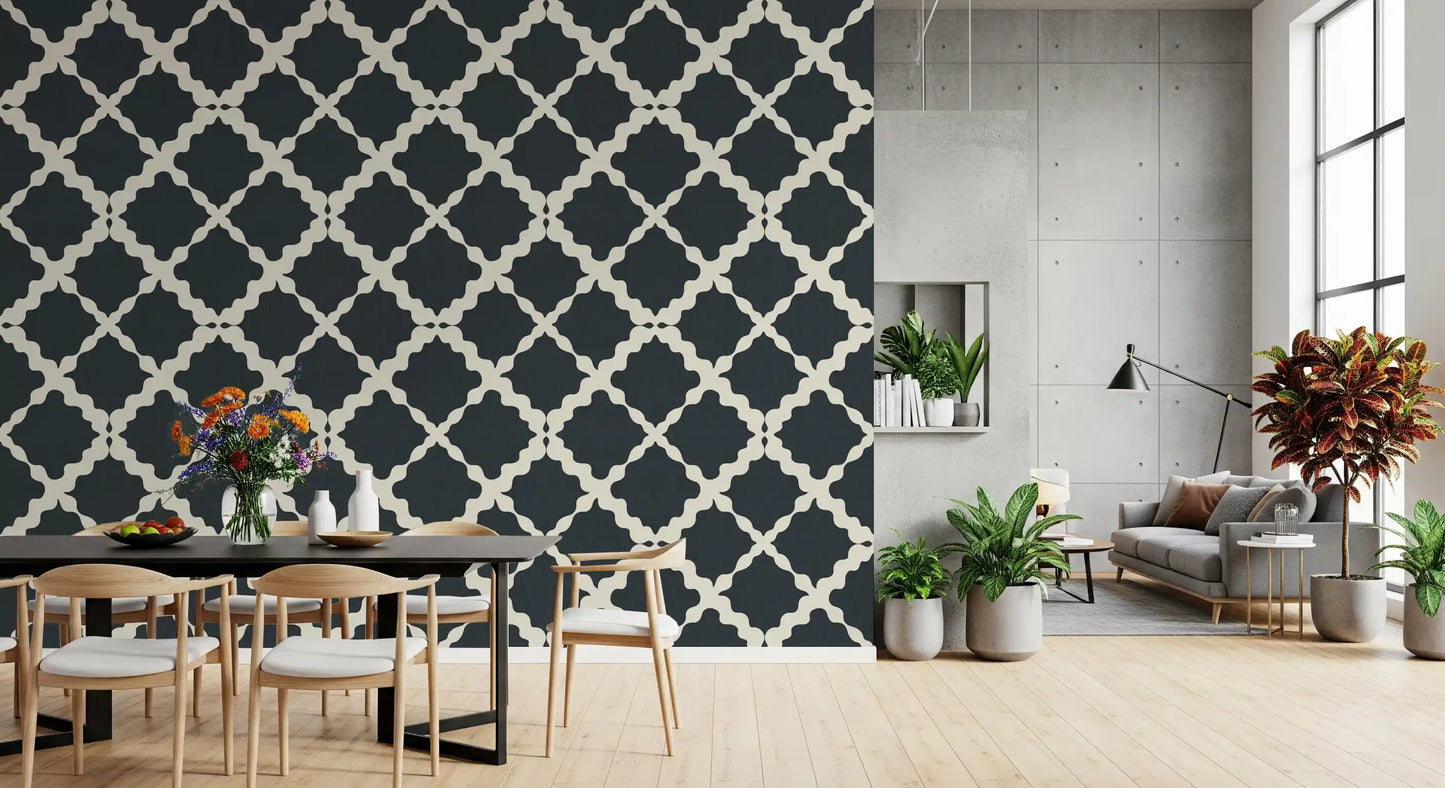 A bright dining room showcases dark contrast through this geometric trellis wallpaper.