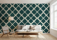A living room gains clean structure through deep teal lattice wallpaper detail