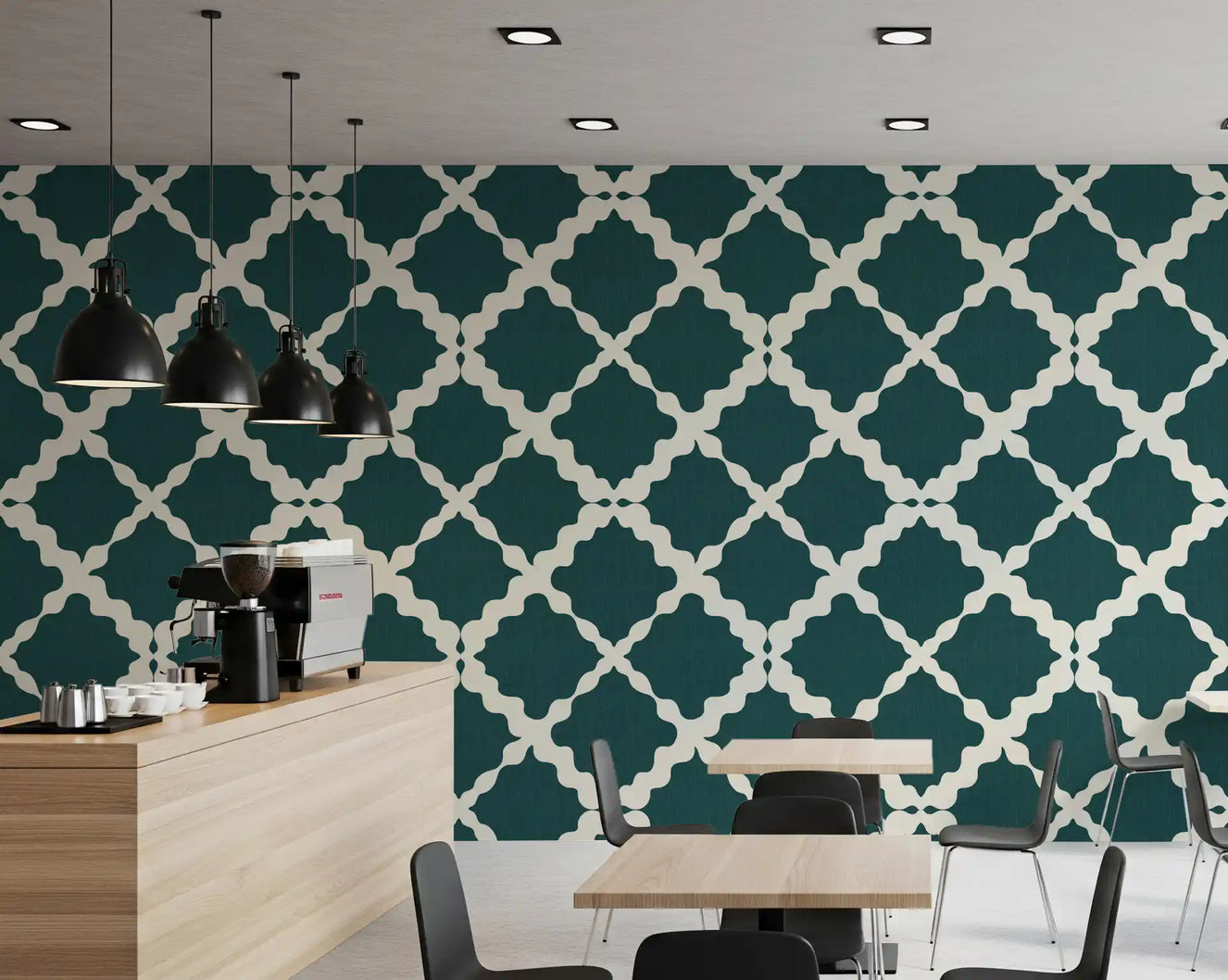Cream quatrefoil patterning over deep teal wallpaper keeps a Café quietly modern