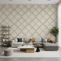 Linen textured ground sits beneath the quatrefoil wallpaper of a neutral lounge.
