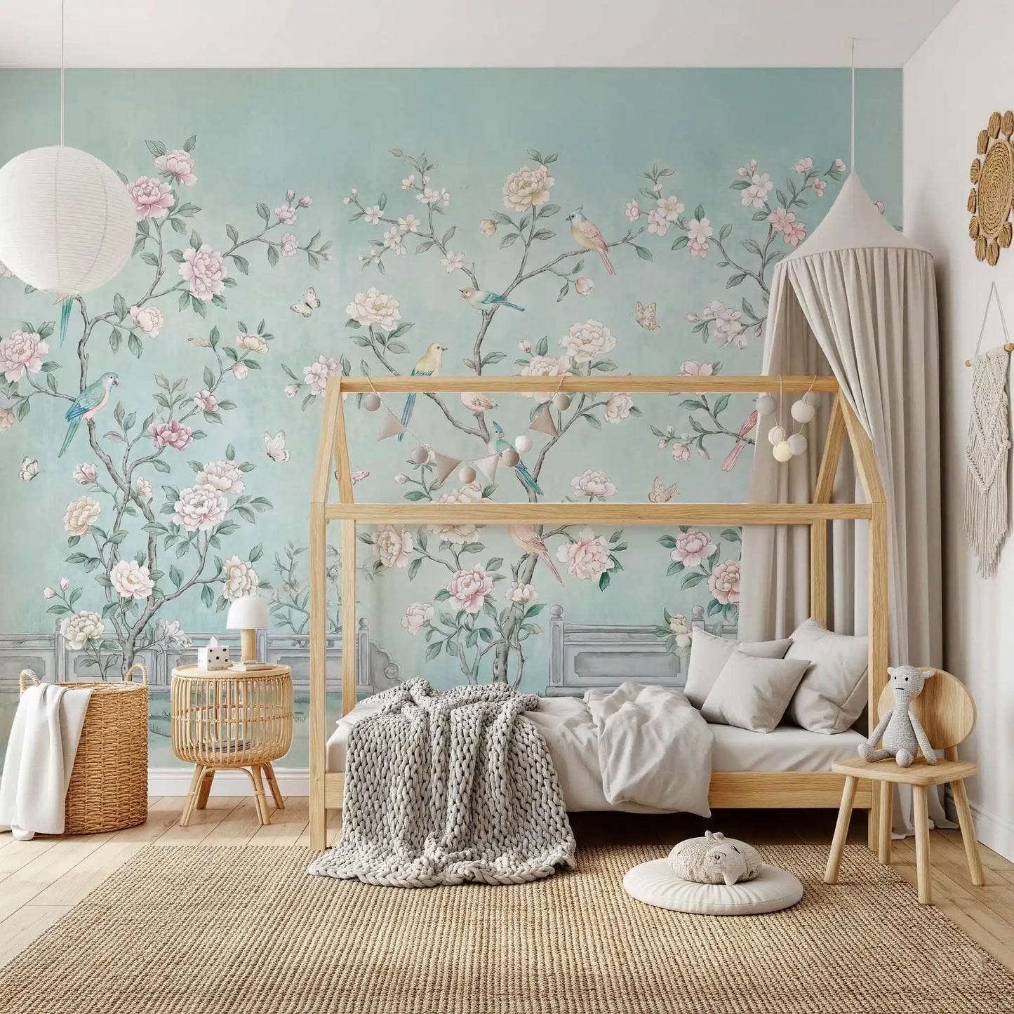 Yellow and blue birds rest among flowering stems of this Chinoiserie Aviary wall mural.