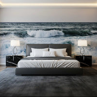 Rolling surf coats the Ocean wall mural across a wide surface inside the bedroom.