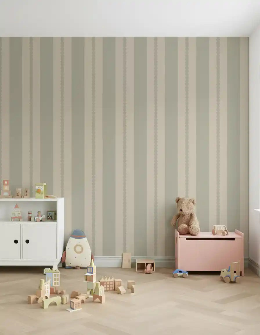 Nursery featuring Muted Scallop & Dot Stripes Wallpaper behind a white couch