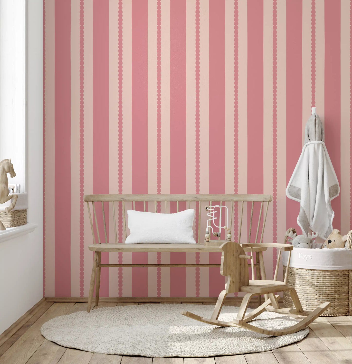 Blush Scallop Stripes Wallpaper revealing straight and undulating vertical pink borders.