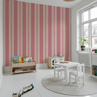Nursery walls featuring the vertical geometric Blush Scallop Stripes Wallpaper motif.