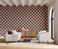 This checkered wallpaper fills the Living room space area .