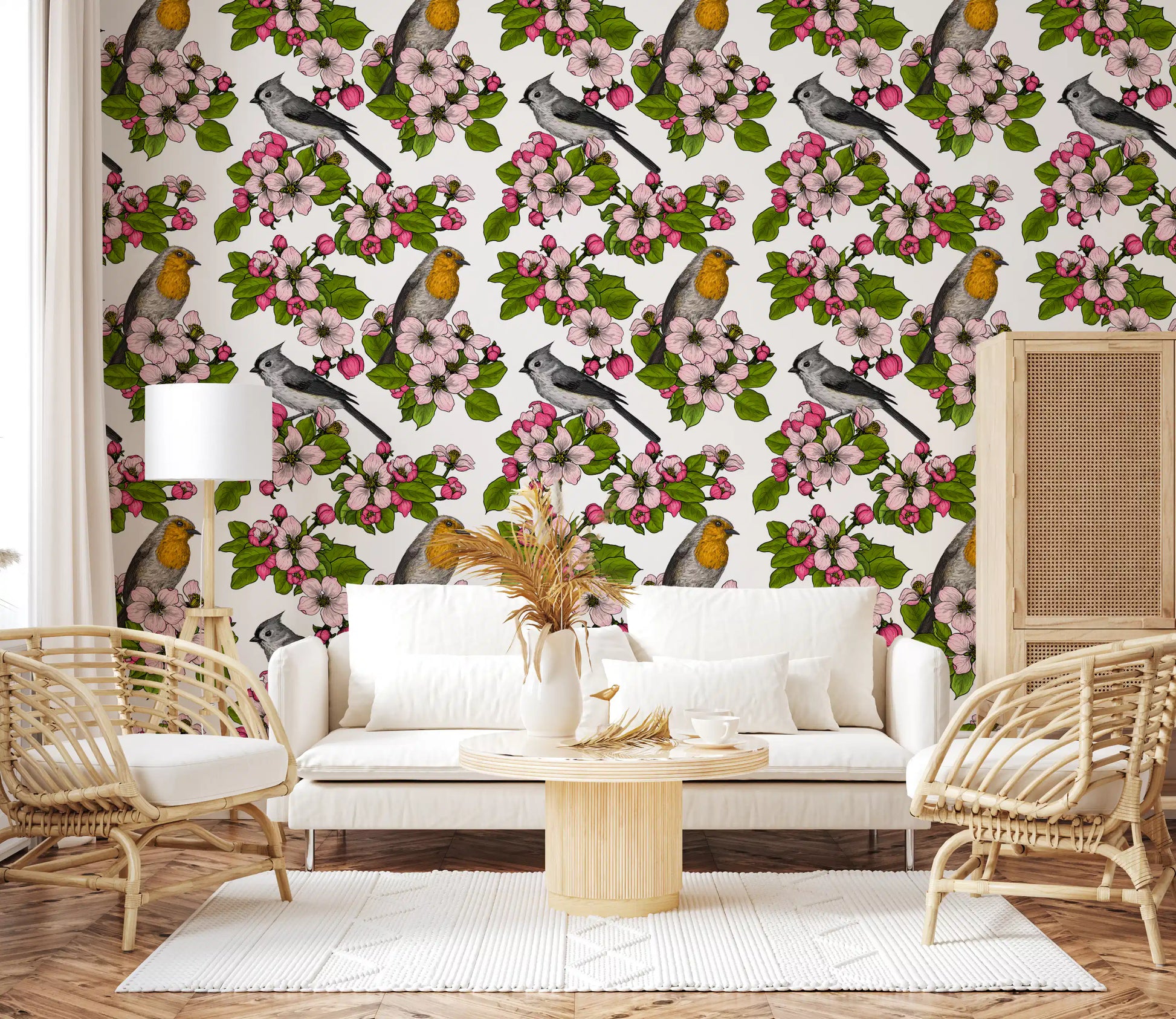Botanical motifs give a Living room quiet garden feel via Birds and Blossoms wallpaper.