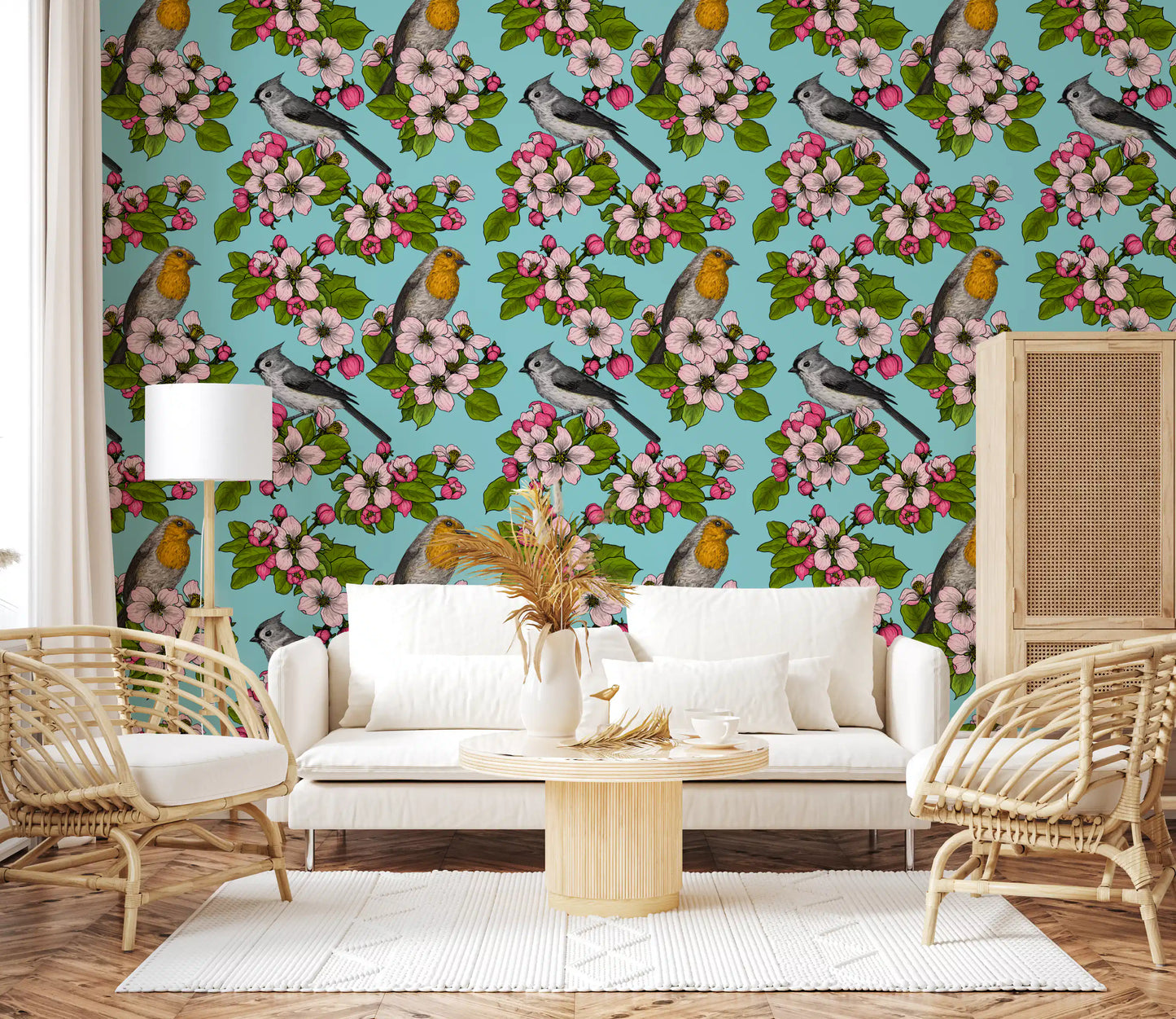 Pink blossom clusters arrive on the wallpaper above a quiet lounge