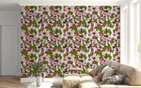 Pink floral patterns detail the white wallpaper throughout the Living room.
