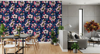 blooming branches cover the detailed apple wallpaper throughout this Living and dining room .