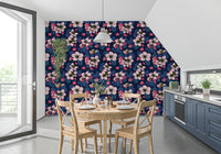 Golden insects rest calmly among illustrated spring flowers upon the blue wallpaper.