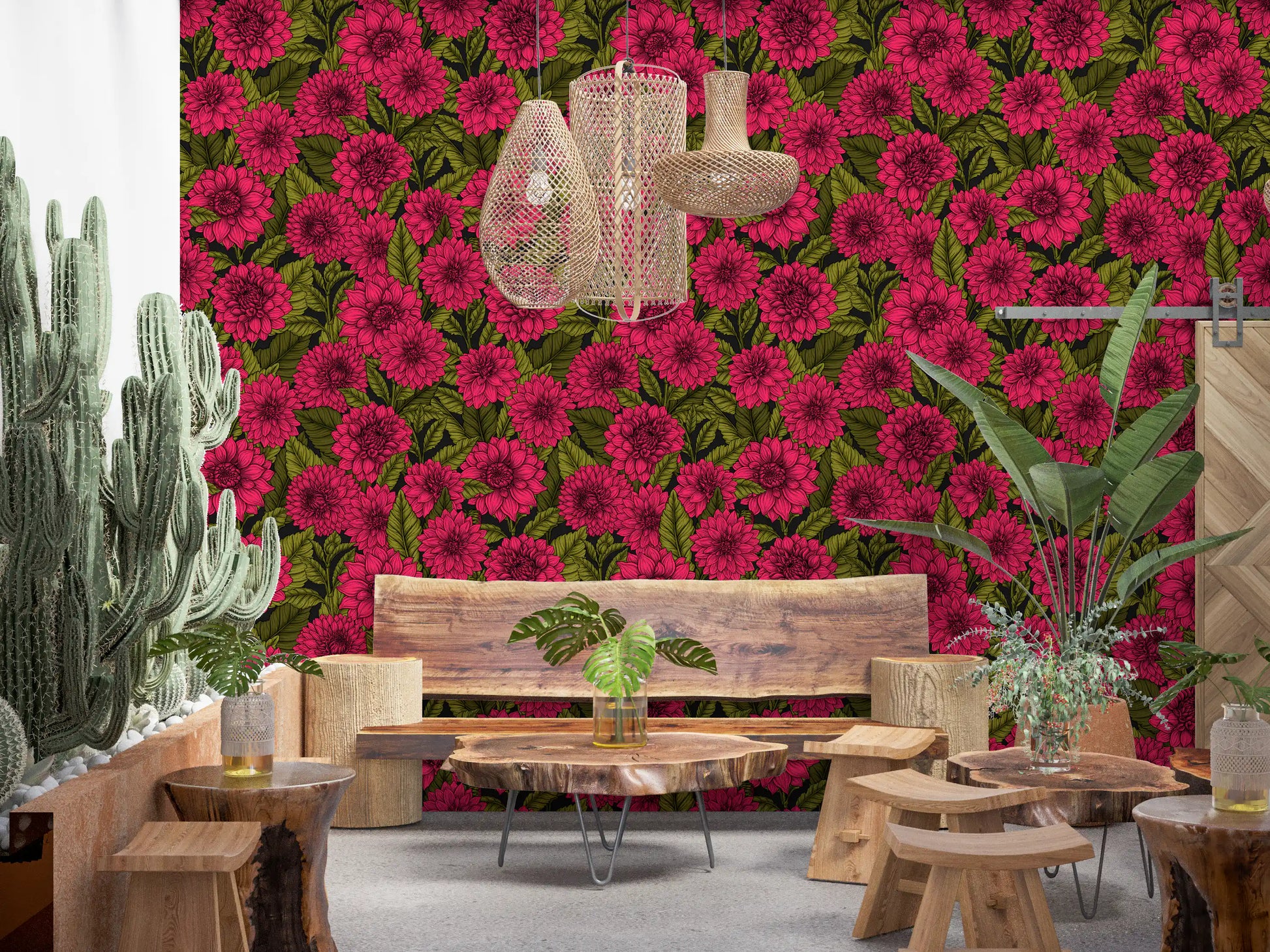 Lush green plants complement the vibrant pink Dahlia wallpaper inside the restaurant dining area 