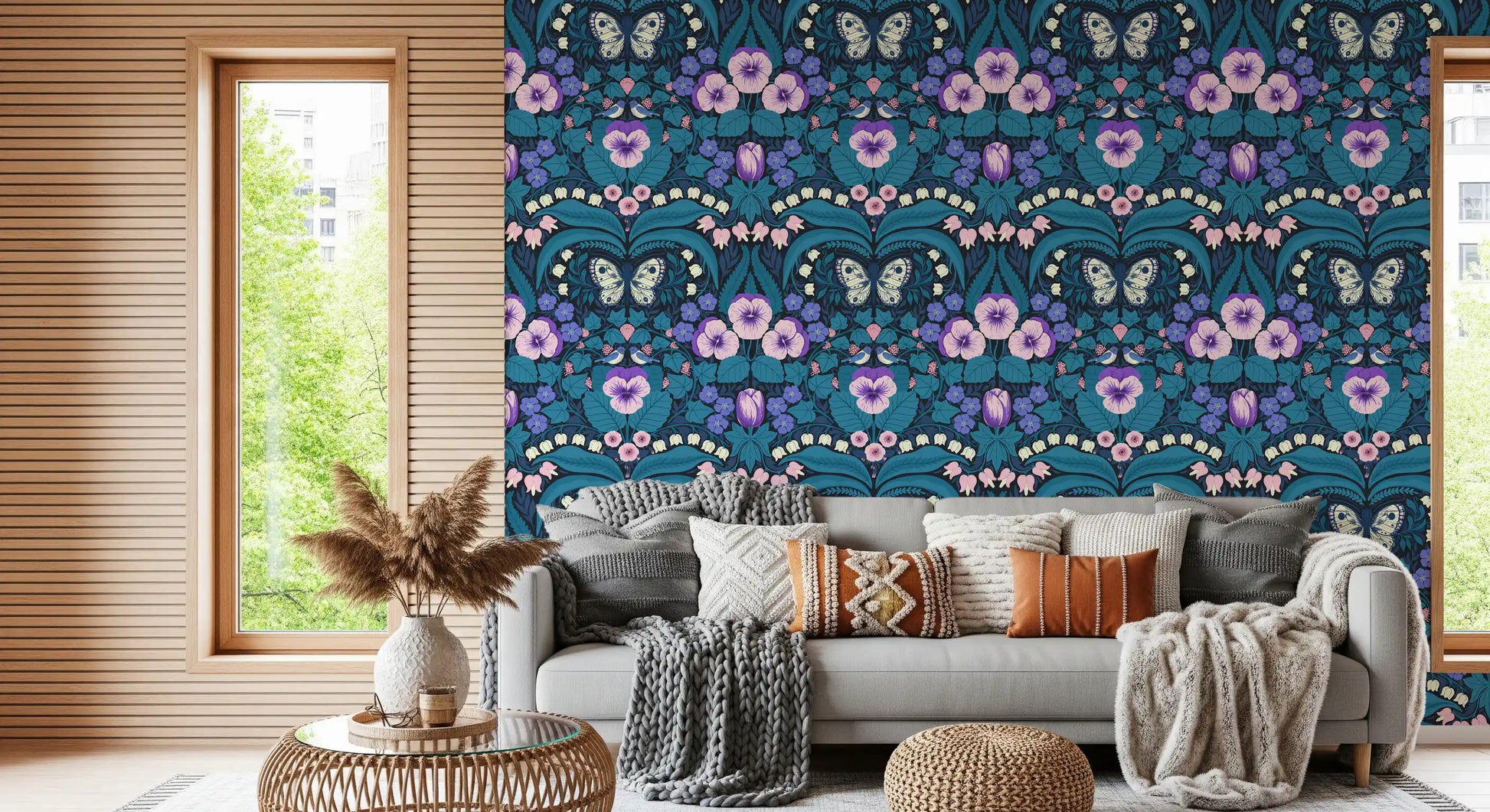 A comfortable Living room feels unique featuring the birds wallpaper.