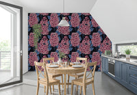 The Lilac Wallpaper exhibits highly detailed pink petals over a dark base.