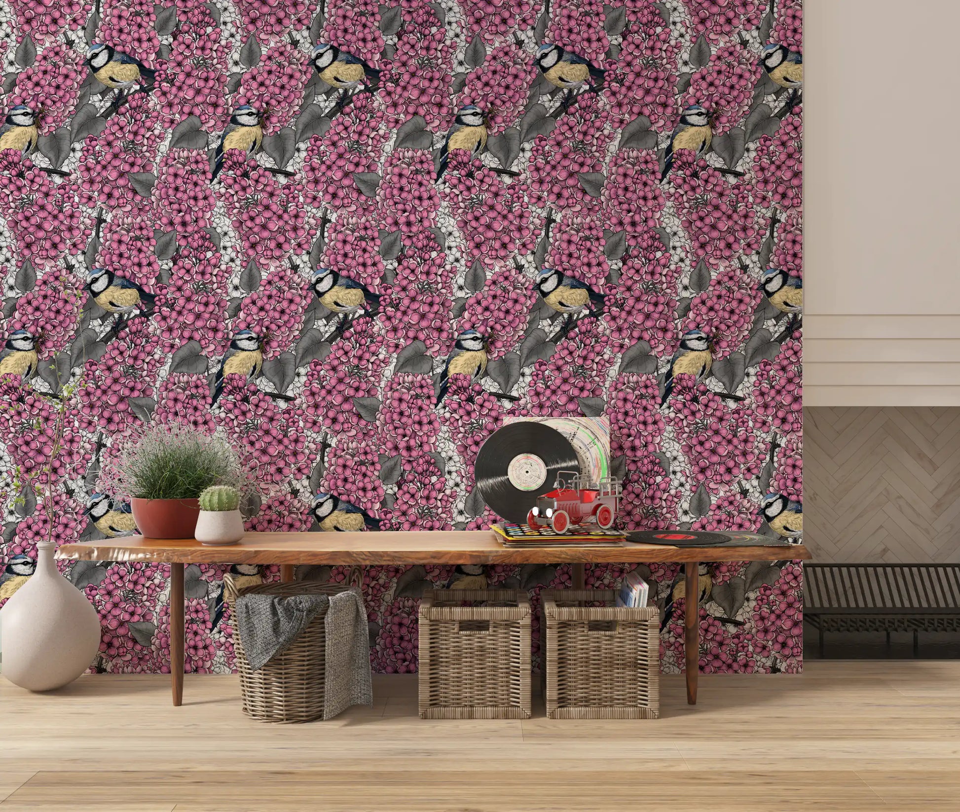 A Hallway uses the Birds in pink lilac garden wallpaper for a fresh look.