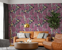 The Birds in pink lilac garden wallpaper creates a backdrop for this lounge.