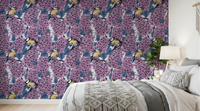Birds in violet lilac garden wallpaper creates a serene mood in the bedroom.